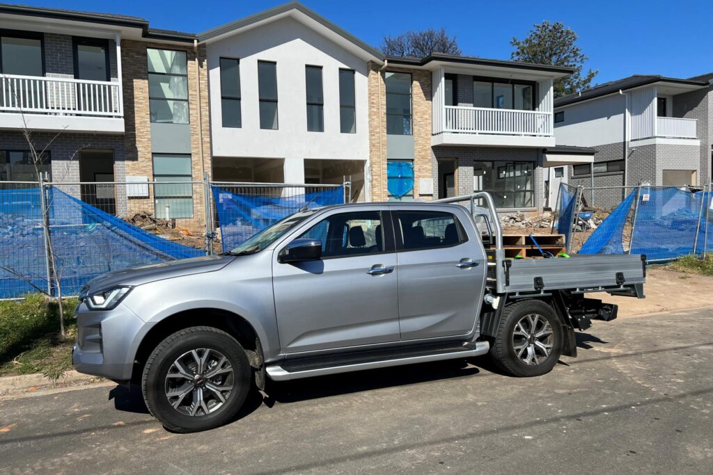 Isuzu D-Max LS-U Dual Cab Trayback 4WD Ute at building site 1